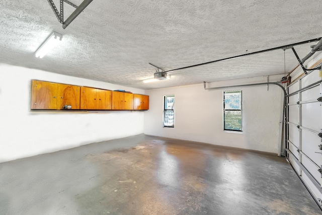 1290 SE Mcfarlane Ave, Port Saint Lucie, FL 34952 - garage featuring a garage door opener