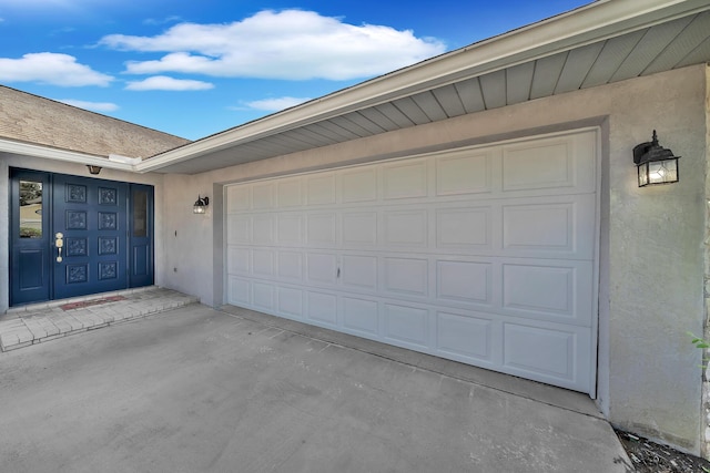 1290 SE Mcfarlane Ave, Port Saint Lucie, FL 34952 - garage featuring driveway