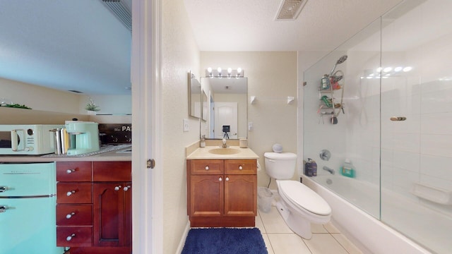 15511 63rd Pl N, Loxahatchee, FL 33470 - bathroom featuring toilet, tile patterned flooring, vanity, and bathtub / shower combination
