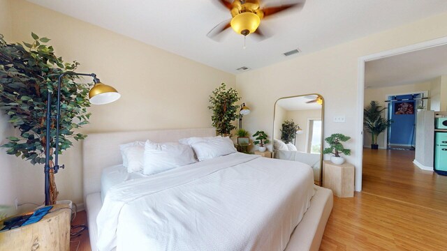 15511 63rd Pl N, Loxahatchee, FL 33470 - bedroom with wood finished floors and a ceiling fan