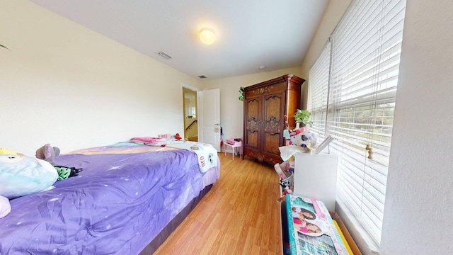 15511 63rd Pl N, Loxahatchee, FL 33470 - bedroom featuring light wood-type flooring