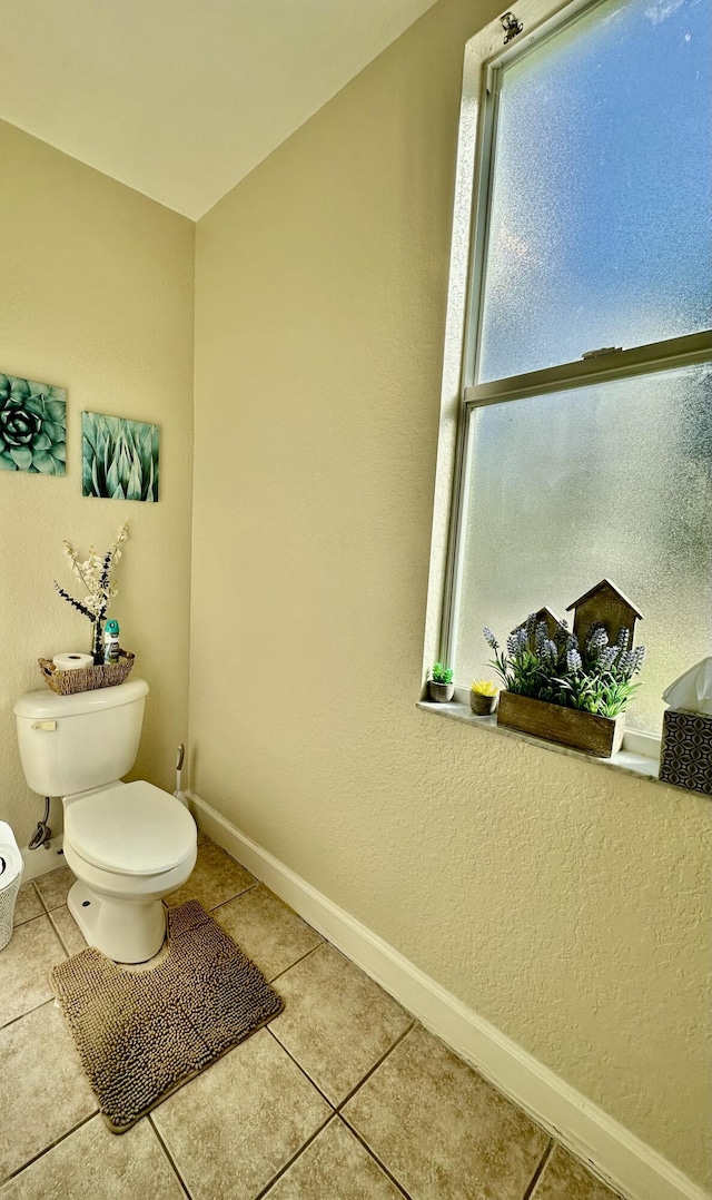 15511 63rd Pl N, Loxahatchee, FL 33470 - bathroom featuring toilet, tile patterned floors, and baseboards