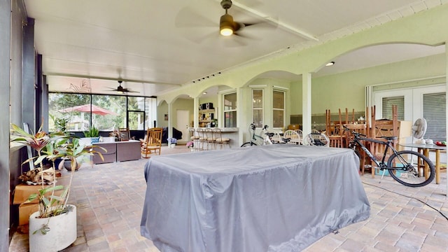 15511 63rd Pl N, Loxahatchee, FL 33470 - view of patio / terrace with ceiling fan, an outdoor living space, outdoor dining space, and french doors