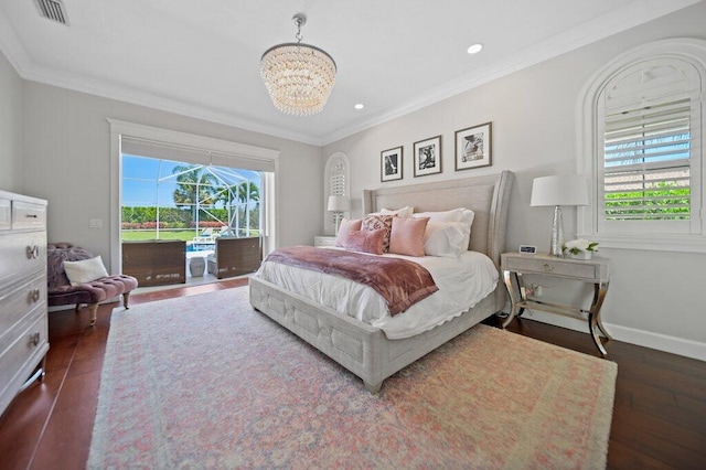5211 SW Bimini Cir N, Palm City, FL 34990 - bedroom featuring access to exterior, dark wood-style floors, a chandelier, ornamental molding, and baseboards