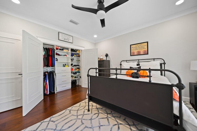 5211 SW Bimini Cir N, Palm City, FL 34990 - bedroom featuring wood finished floors, crown molding, a closet, recessed lighting, and a ceiling fan