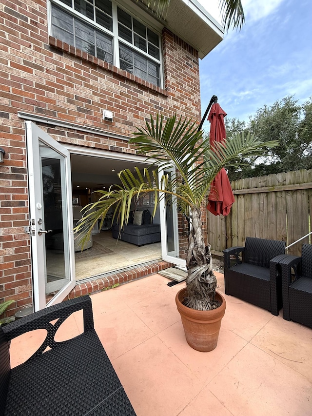view of patio with fence