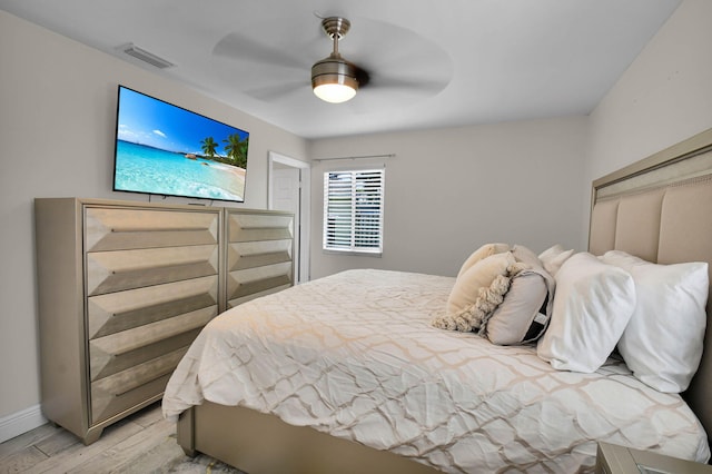 9794 Ridgecreek Rd, Boca Raton, FL 33496 - bedroom featuring light wood-style flooring, a ceiling fan, and baseboards