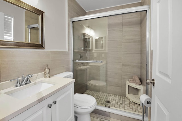 9794 Ridgecreek Rd, Boca Raton, FL 33496 - full bath with toilet, a shower stall, tile walls, and vanity
