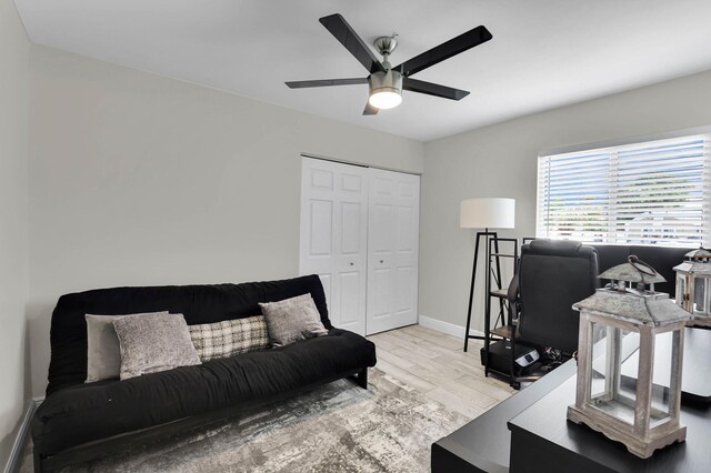 9794 Ridgecreek Rd, Boca Raton, FL 33496 - office area featuring a ceiling fan, wood finished floors, and baseboards