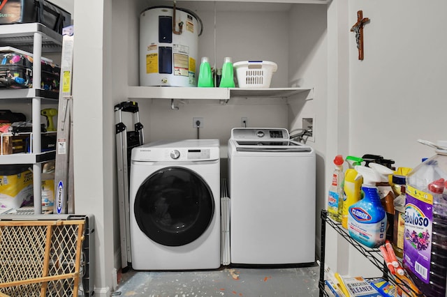 9794 Ridgecreek Rd, Boca Raton, FL 33496 - laundry room with electric water heater and washing machine and clothes dryer