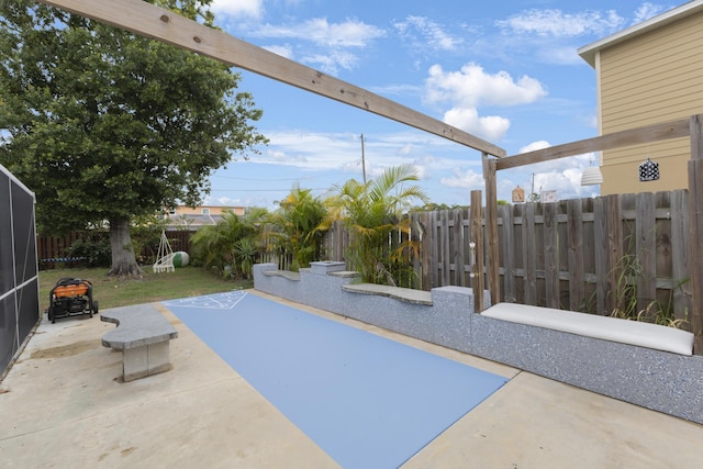view of sport court featuring a fenced backyard