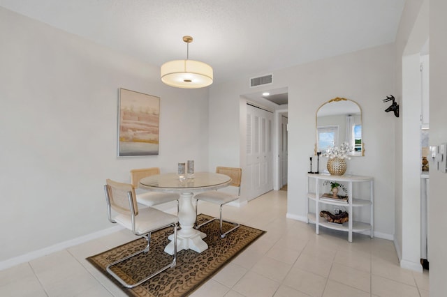 4030 Durham B, Deerfield Beach, FL 33442 - dining space with baseboards and light tile patterned flooring