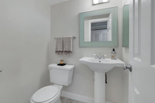 4030 Durham B, Deerfield Beach, FL 33442 - half bath featuring toilet and baseboards