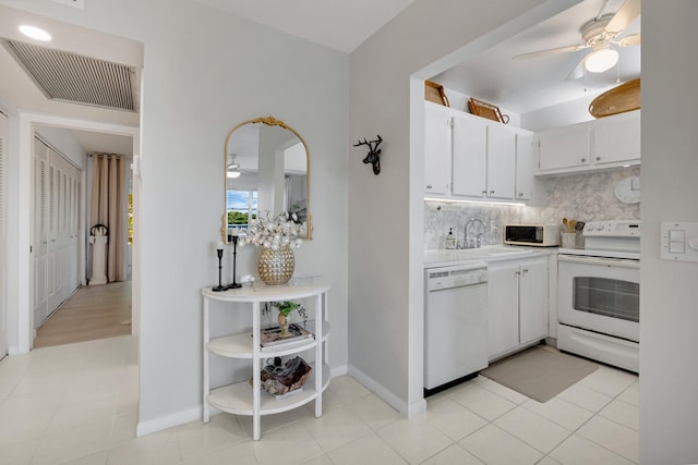 4030 Durham B, Deerfield Beach, FL 33442 - kitchen with white appliances, ceiling fan, decorative backsplash, light countertops, and a sink