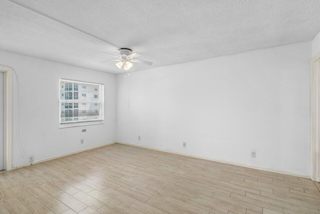 2871 N Ocean Blvd Unit M334, Boca Raton, FL 33431 - unfurnished room with ceiling fan, light wood-style floors, and a textured ceiling