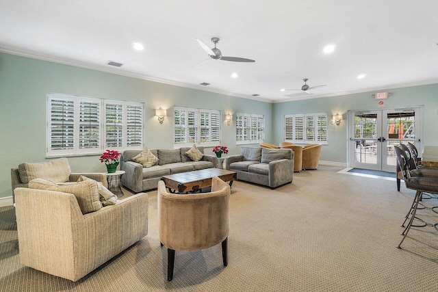 2871 N Ocean Blvd Unit M334, Boca Raton, FL 33431 - carpeted living room with crown molding, french doors, ceiling fan, recessed lighting, and healthy amount of natural light