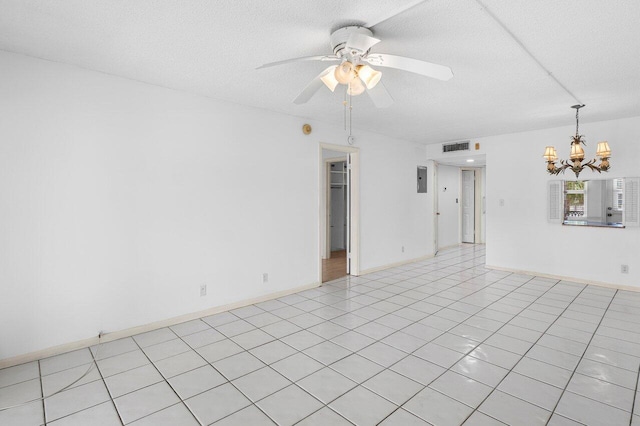 2871 N Ocean Blvd Unit M334, Boca Raton, FL 33431 - spare room featuring a chandelier, a ceiling fan, and a textured ceiling