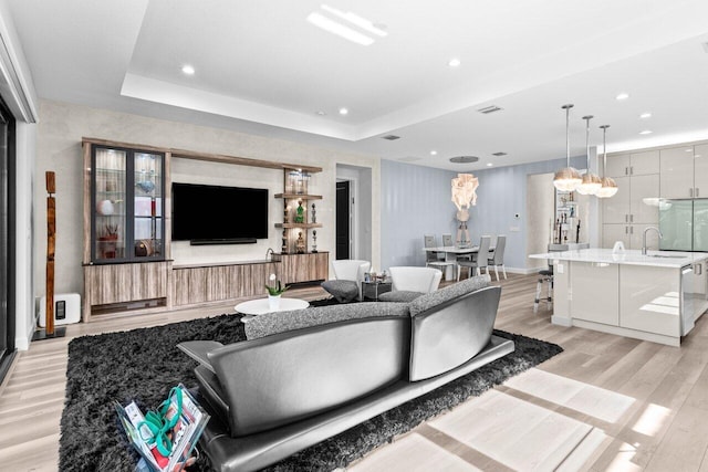 9333 Mountain Pine Grv, Boynton Beach, FL 33473 - living room featuring light wood-style flooring and recessed lighting