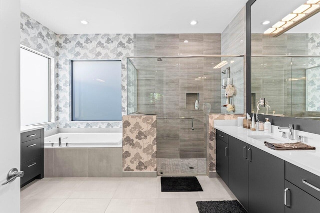 9333 Mountain Pine Grv, Boynton Beach, FL 33473 - bathroom featuring vanity, a shower stall, a garden tub, tile patterned floors, and recessed lighting
