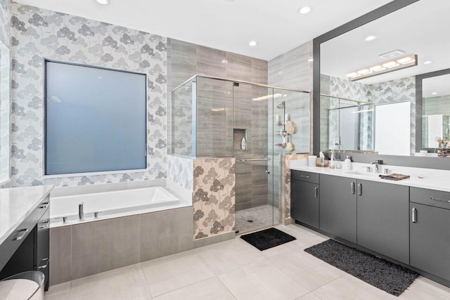 9333 Mountain Pine Grv, Boynton Beach, FL 33473 - bathroom featuring vanity, a stall shower, a garden tub, tile patterned floors, and recessed lighting