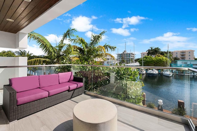 120 N Gordon Rd Share A, Unit Share A, Fort Lauderdale, FL 33301 - view of patio with outdoor lounge area, a balcony, and a water view