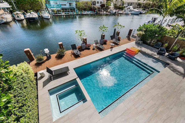 120 N Gordon Rd Share A, Unit Share A, Fort Lauderdale, FL 33301 - view of swimming pool with a water view, a patio area, and a pool with connected hot tub