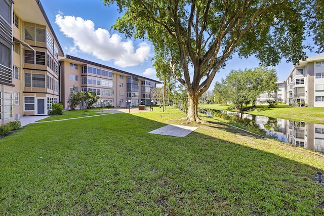 surrounding community featuring a yard