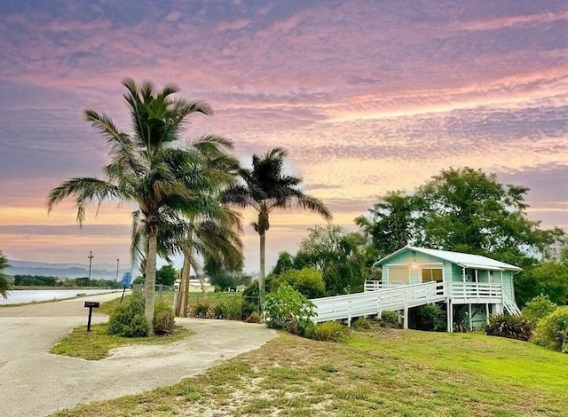 851 Riverside Dr, Moore Haven, FL 33471 - view of property's community with a yard and a water view