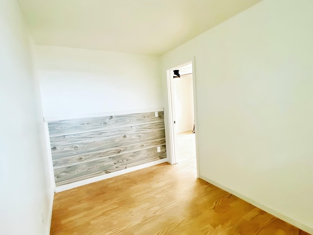 851 Riverside Dr, Moore Haven, FL 33471 - spare room featuring wood finished floors and baseboards