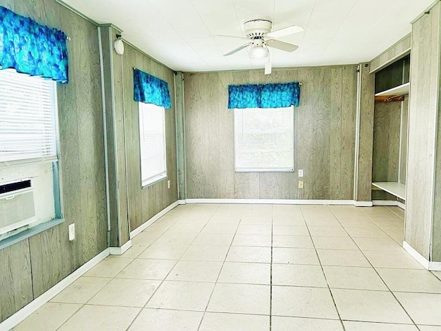 851 Riverside Dr, Moore Haven, FL 33471 - unfurnished bedroom with multiple windows, tile patterned floors, and ceiling fan