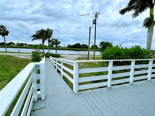 851 Riverside Dr, Moore Haven, FL 33471 - wooden terrace with a water view