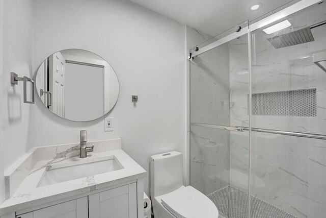 5048 Petal Pl Unit C, Delray Beach, FL 33484 - full bathroom with toilet, a marble finish shower, vanity, and recessed lighting