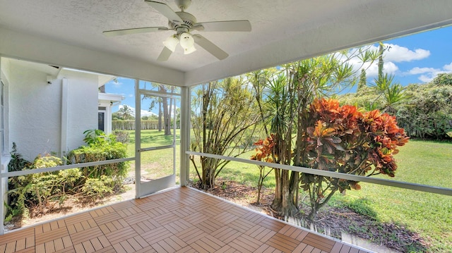 5048 Petal Pl Unit C, Delray Beach, FL 33484 - unfurnished sunroom with a ceiling fan