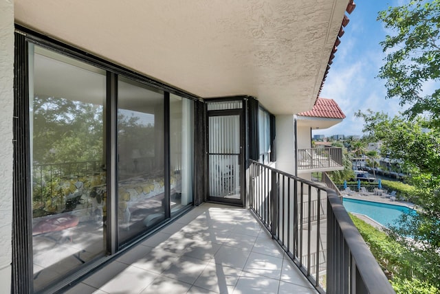 balcony with view of pool area
