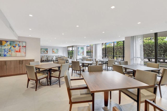 dining space featuring recessed lighting