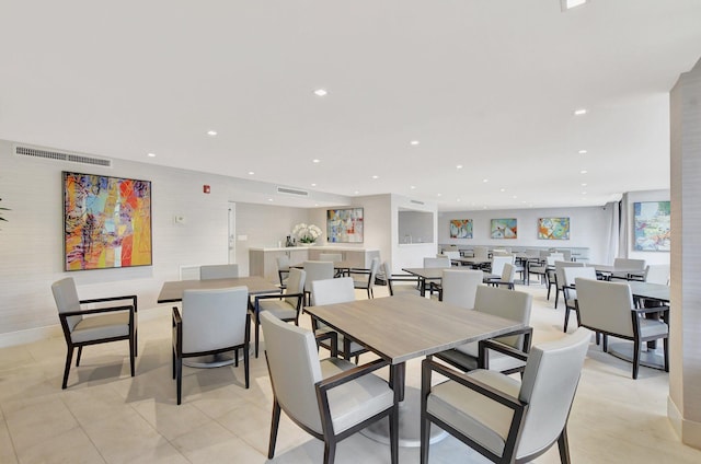 dining room featuring recessed lighting and light tile patterned floors
