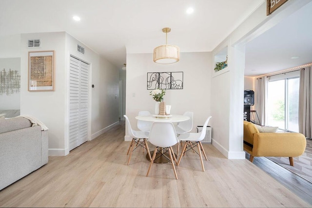 1445 Cindy Dr, Lake Worth Beach, FL 33461 - dining area featuring light wood finished floors, baseboards, and recessed lighting