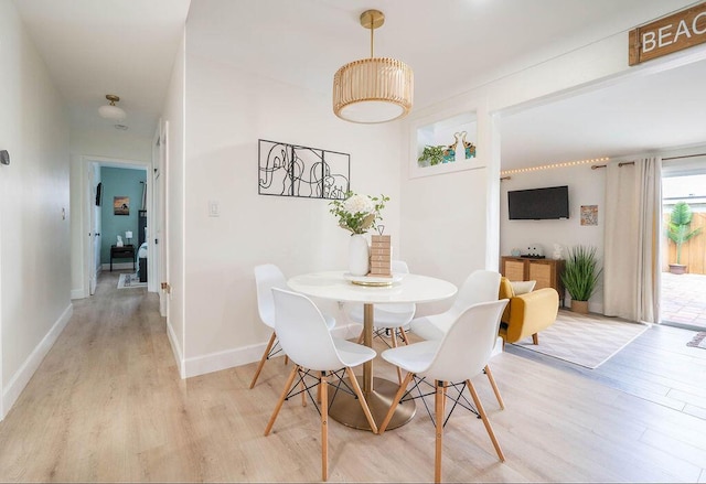 1445 Cindy Dr, Lake Worth Beach, FL 33461 - dining area featuring light wood-style floors and baseboards