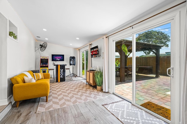 1445 Cindy Dr, Lake Worth Beach, FL 33461 - living room featuring recessed lighting, wood finished floors, and crown molding