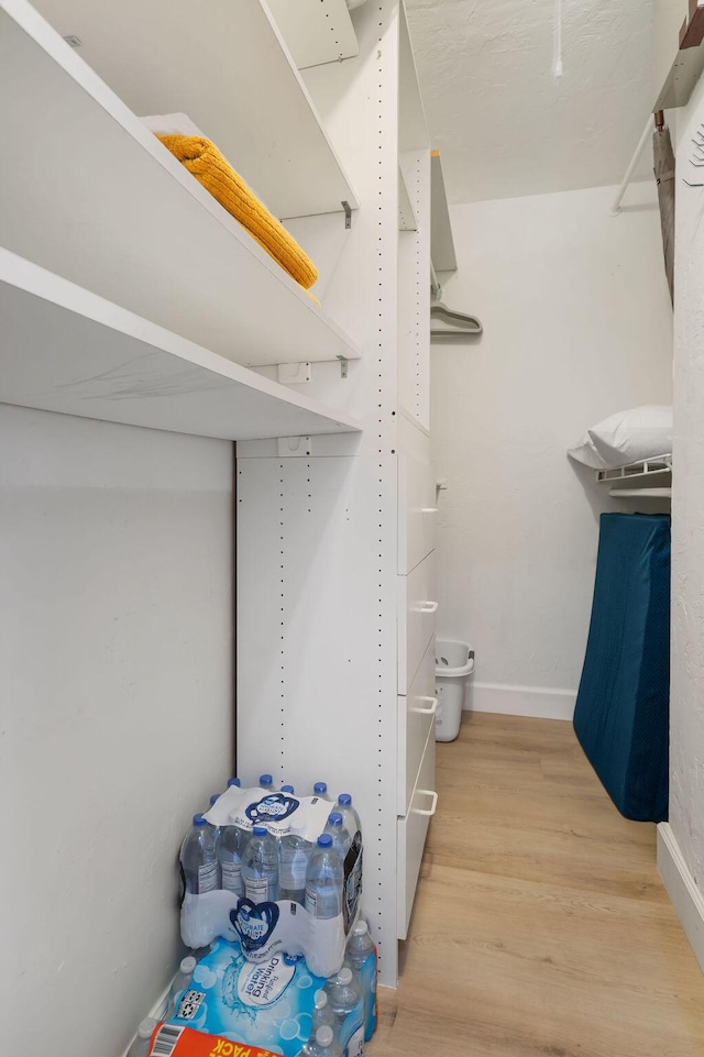 1445 Cindy Dr, Lake Worth Beach, FL 33461 - spacious closet with light wood-style flooring