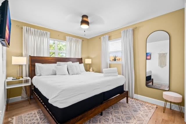 1445 Cindy Dr, Lake Worth Beach, FL 33461 - bedroom with baseboards, wood finished floors, and ceiling fan