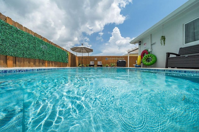 1445 Cindy Dr, Lake Worth Beach, FL 33461 - view of swimming pool featuring fence