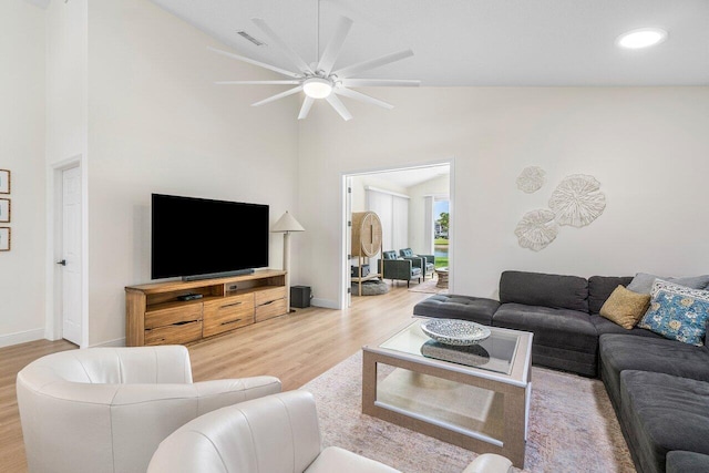 12811 Oak Knoll Dr, Palm Beach Gardens, FL 33418 - living room with wood finished floors, ceiling fan, high vaulted ceiling, baseboards, and recessed lighting