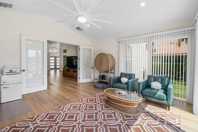 12811 Oak Knoll Dr, Palm Beach Gardens, FL 33418 - sitting room featuring vaulted ceiling, a ceiling fan, wood finished floors, and recessed lighting