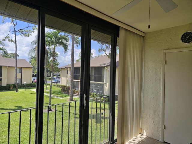 unfurnished sunroom with healthy amount of natural light and a residential view