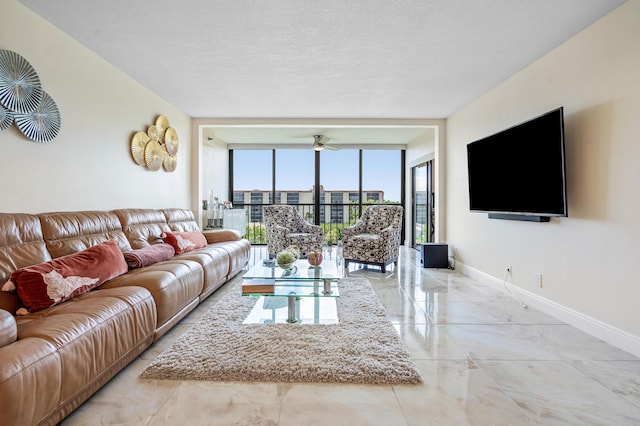 7290 Kinghurst Dr Unit 607, Delray Beach, FL 33446 - living room featuring marble tiled flooring, expansive windows, and a ceiling fan