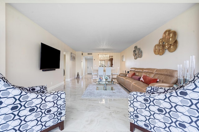 7290 Kinghurst Dr Unit 607, Delray Beach, FL 33446 - living area with marble tiled flooring and a chandelier