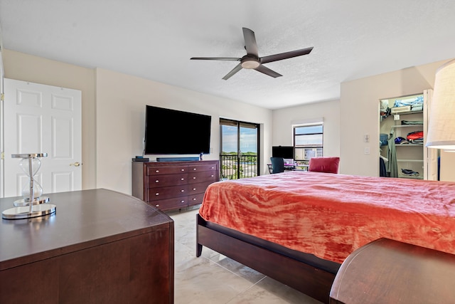 7290 Kinghurst Dr Unit 607, Delray Beach, FL 33446 - bedroom featuring access to exterior and a ceiling fan
