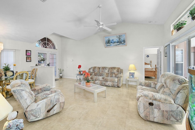 3204 SE Otis Ln, Port Saint Lucie, FL 34984 - living area with high vaulted ceiling, ceiling fan, and baseboards
