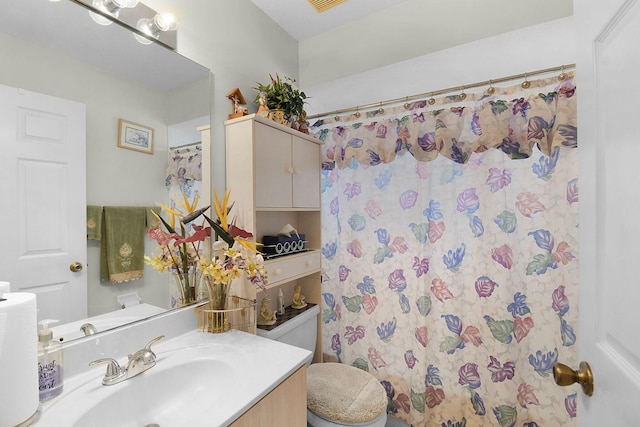 3204 SE Otis Ln, Port Saint Lucie, FL 34984 - bathroom featuring toilet, vanity, and a shower with shower curtain